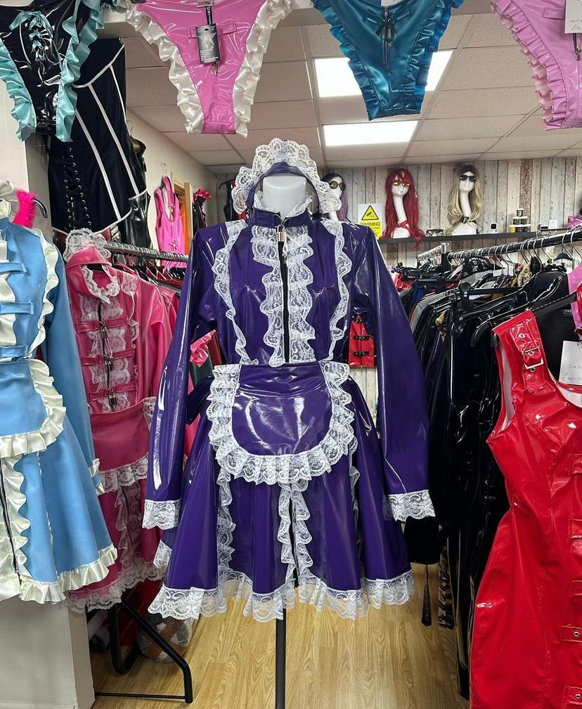 shiny PVC/latex, maid-style, and bondage-inspired outfits.