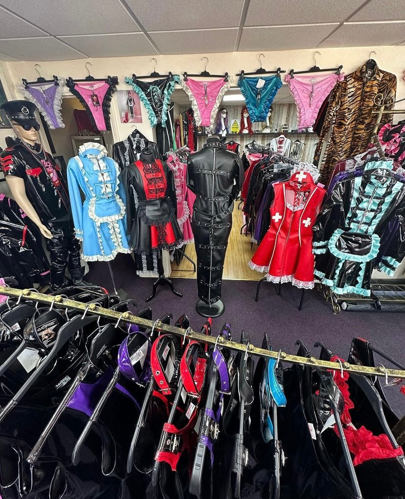 shiny PVC/latex, maid-style, and bondage-inspired outfits.